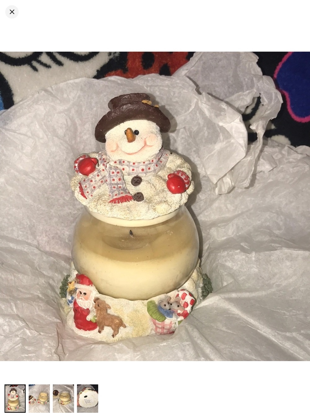 Festive Snowman Candle Holder with Holiday Scene partially burned